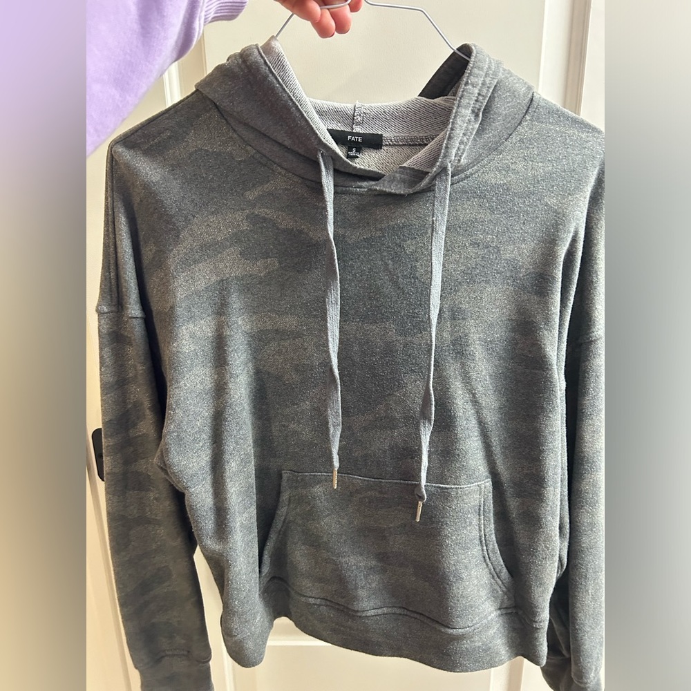 Camo hoodie with slight gold shimmer. Worn a couple of times